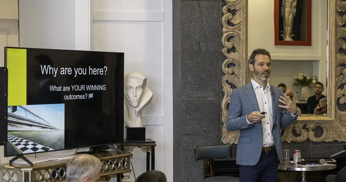 Charles Byrd presenting to entrepreneurs at a Flow Mastermind event